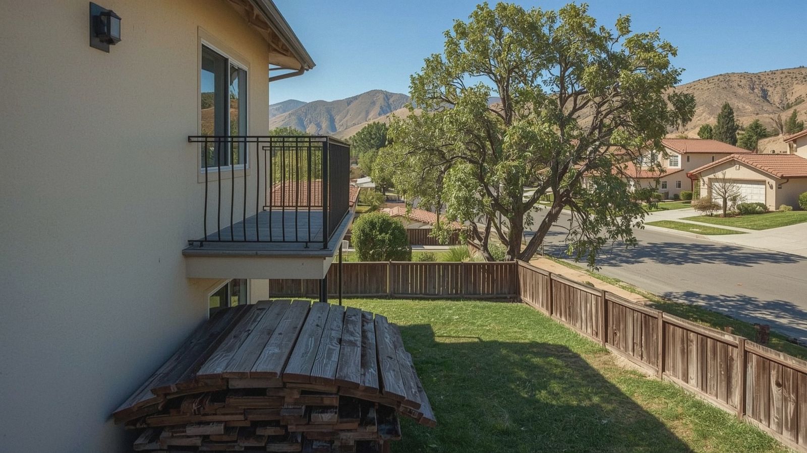 New metal balcony railing replacing worn wood