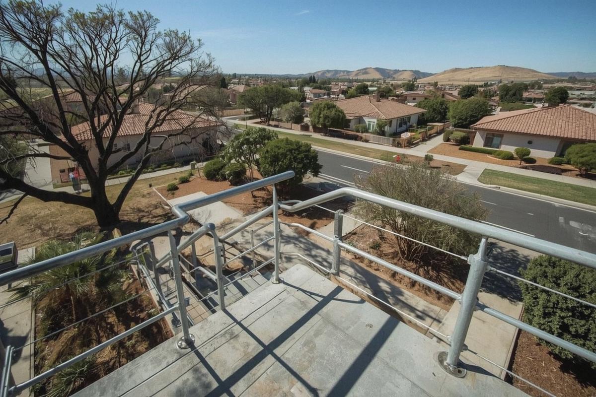 Commercial steel stair guardrail and handrail at an office campus